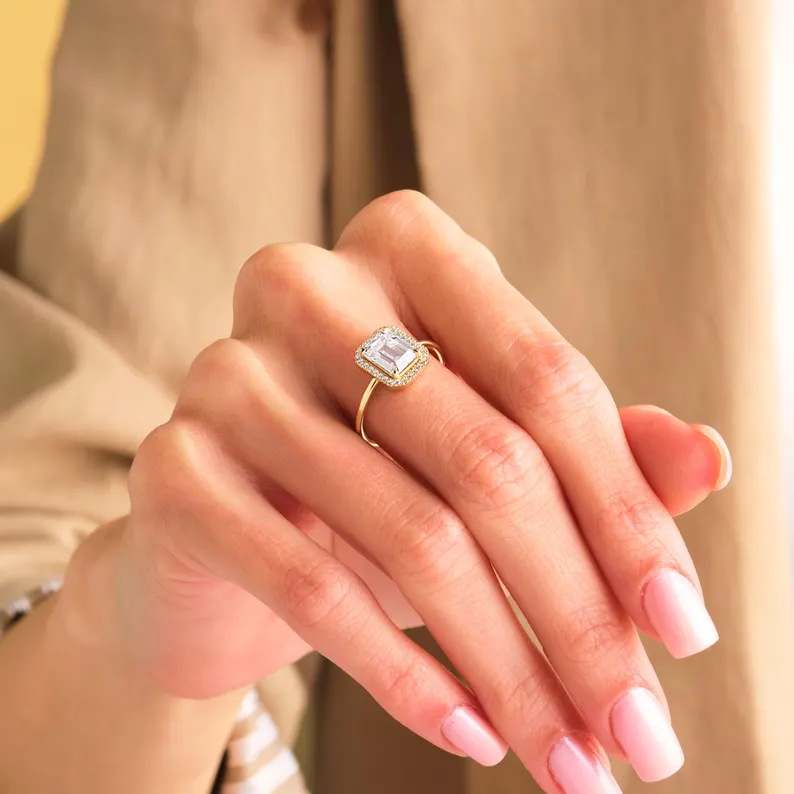Wedding band that complements an emerald cut engagement ring